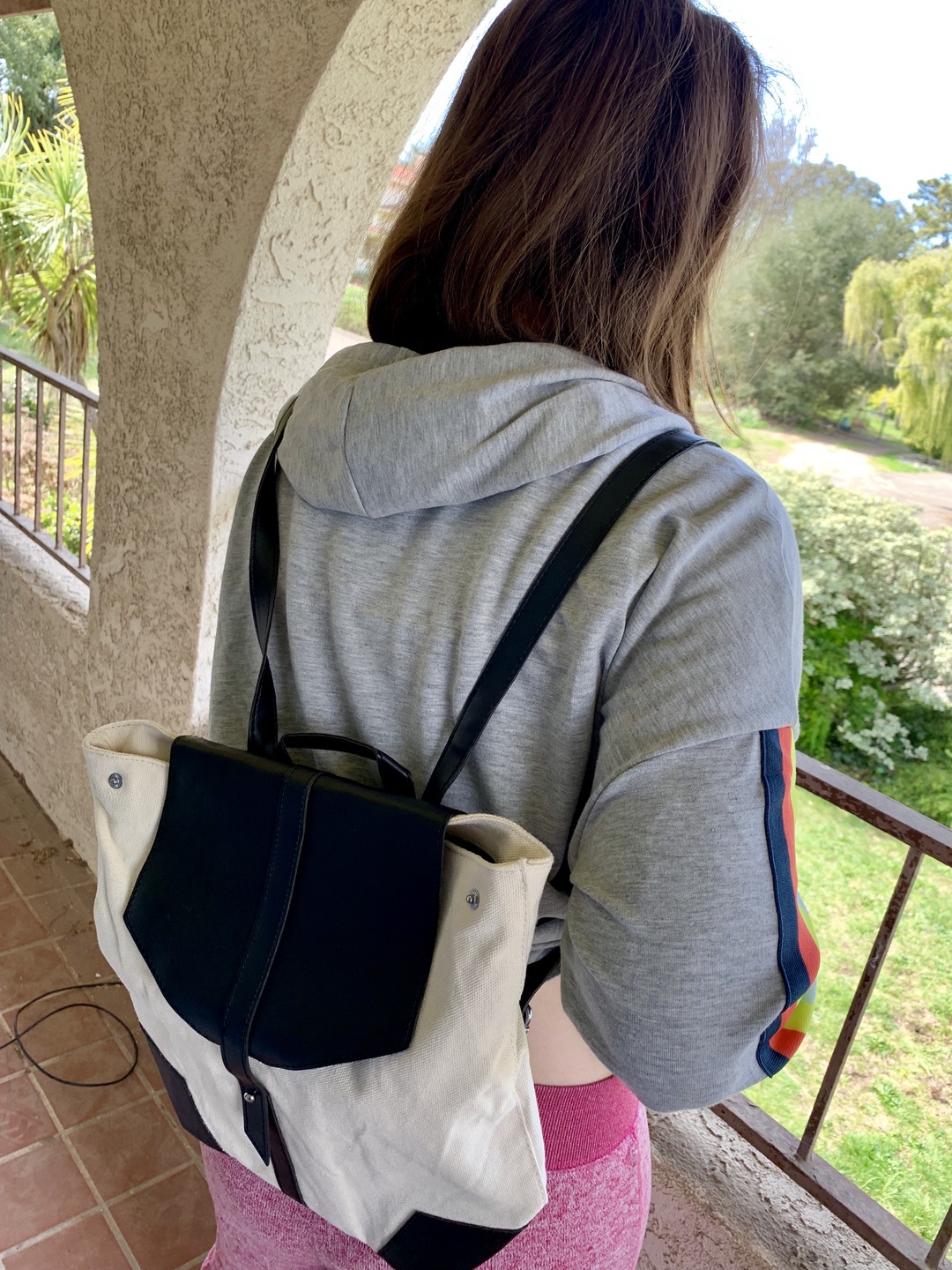 teen girl wearing a backpack from FabFitFun