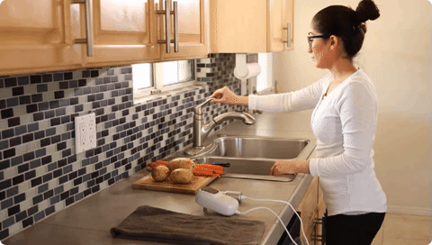 gif of lady cleaning kitchen
