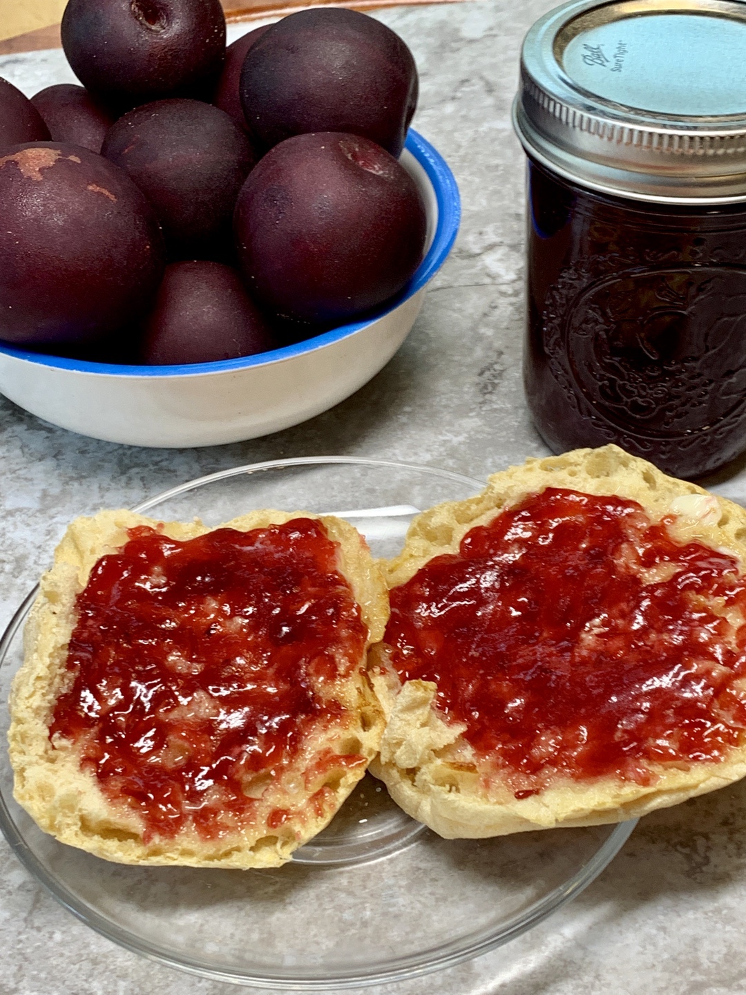 Plums, Jar of plum jam, muffins with plum jam