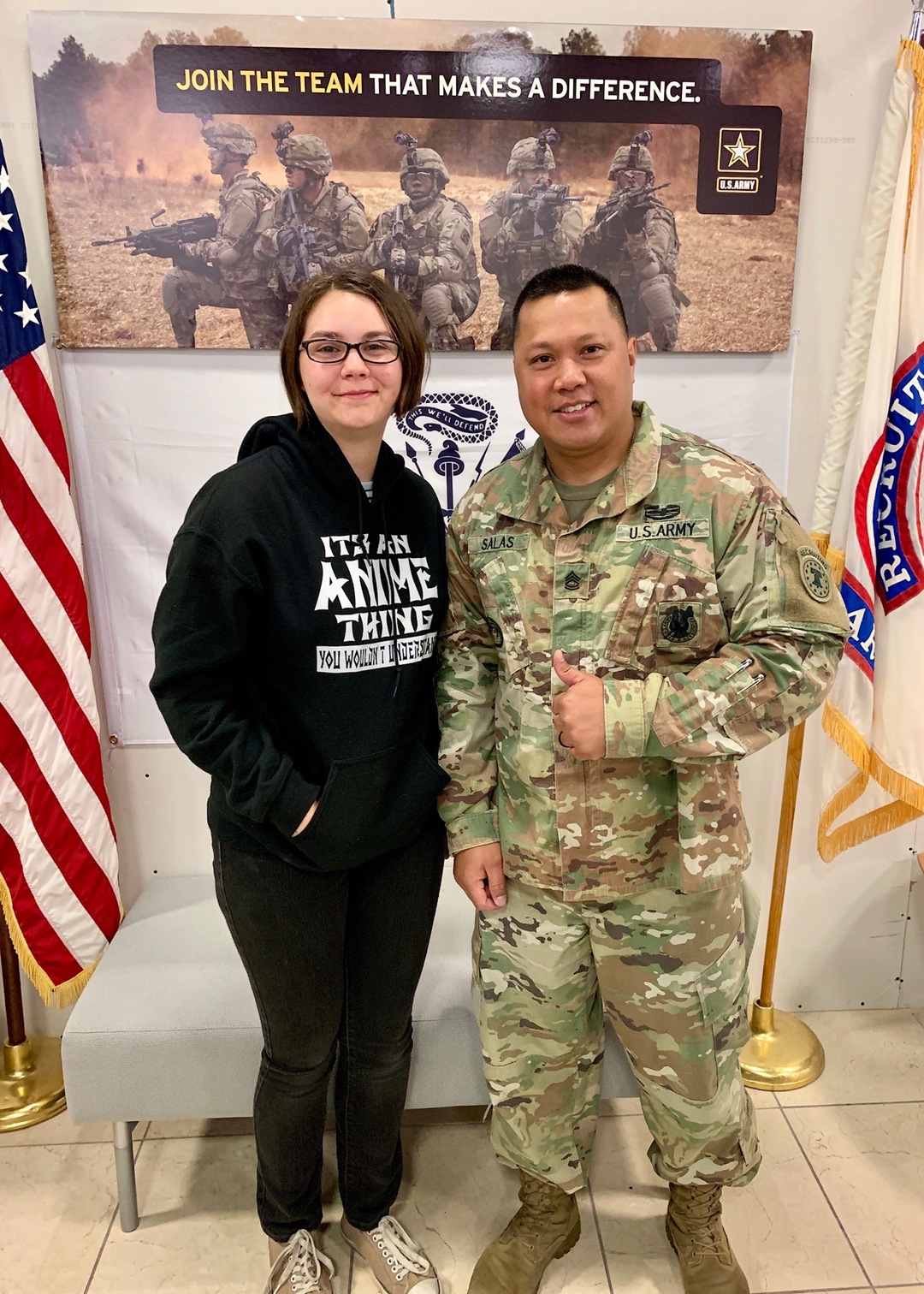 young woman and Army recruiter