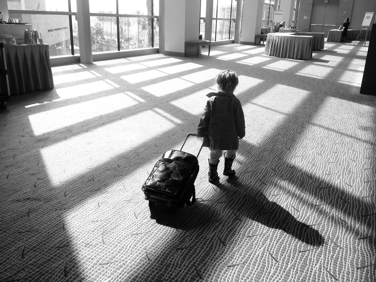 child with suitcase